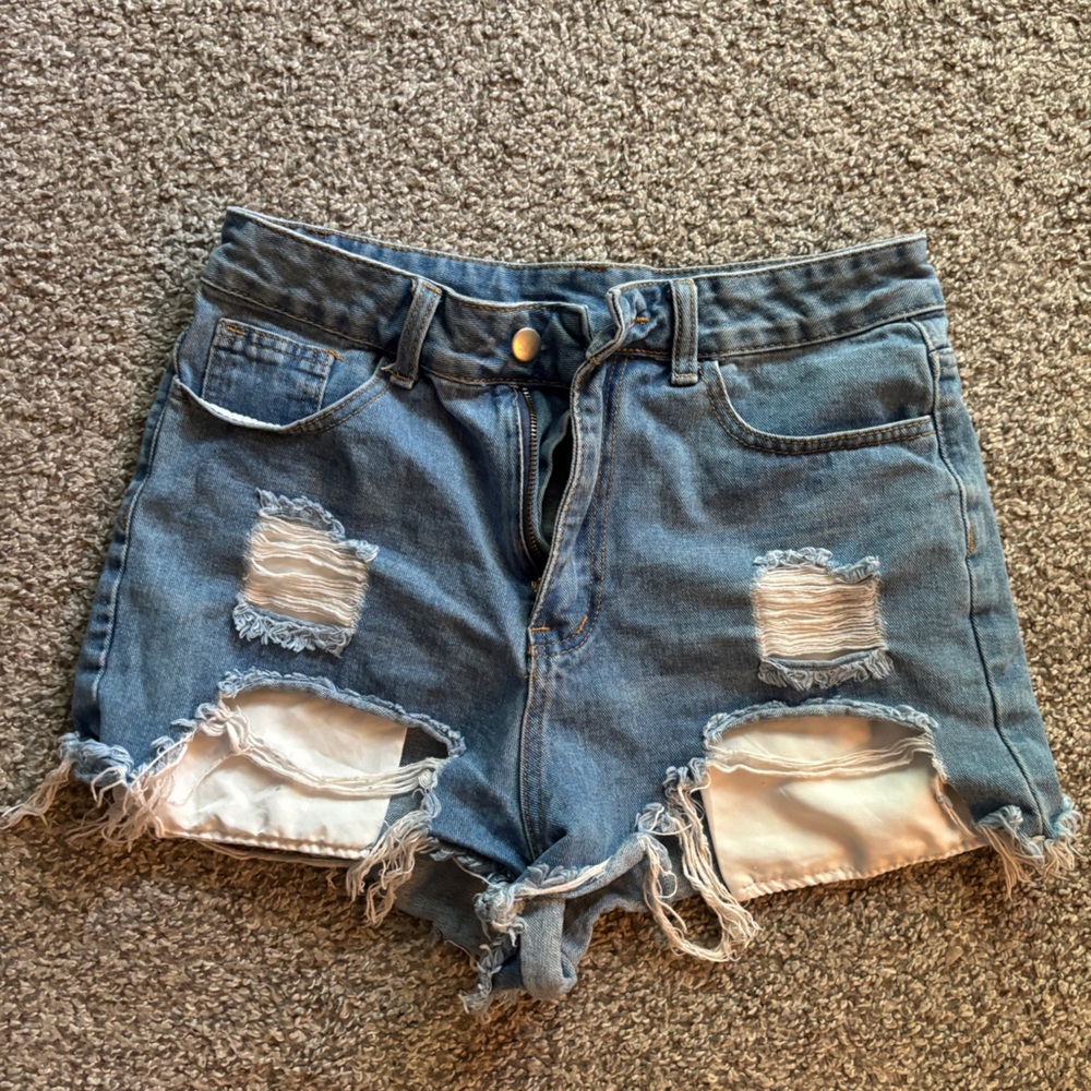 Blue Jean ripped shorts.